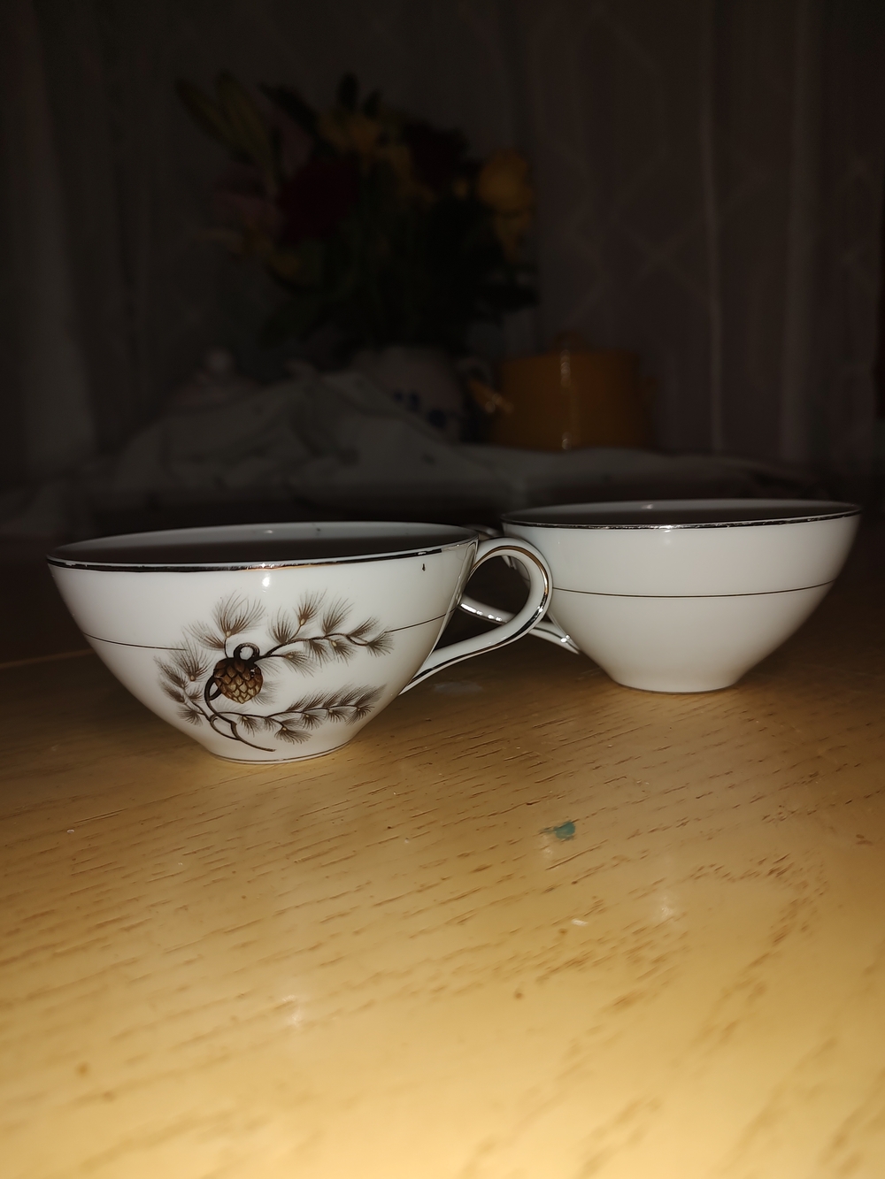 Elegant White Porcelain Teacups with Pinecone Motif